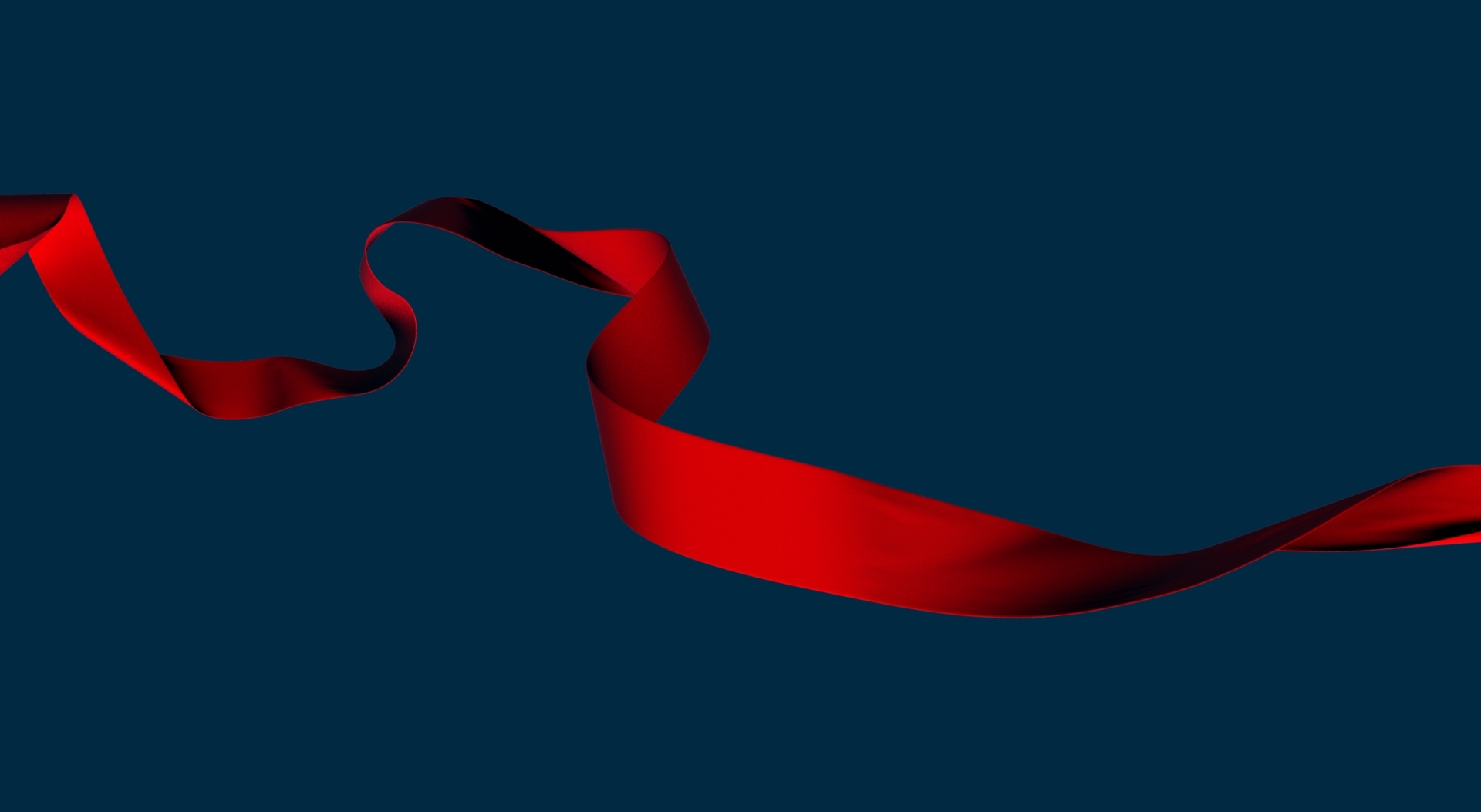 dark background with red ribbon